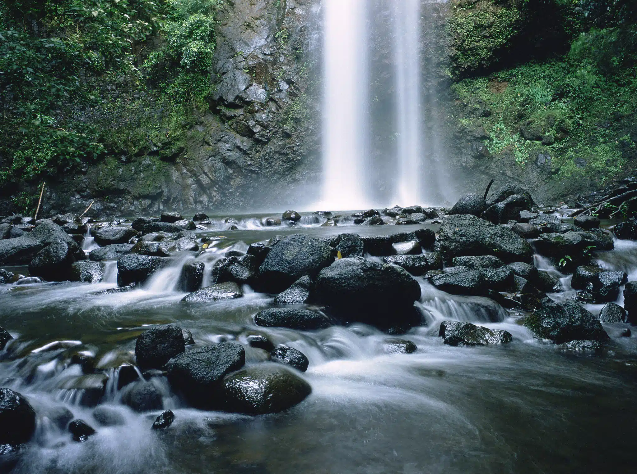 Uluwehi Falls (Secret Falls) is a Waterfall located in the city of Kapaa on Kauai, Hawaii